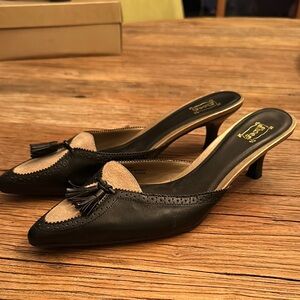 Black and Tan Mules with Low Heel and Tassel Detail